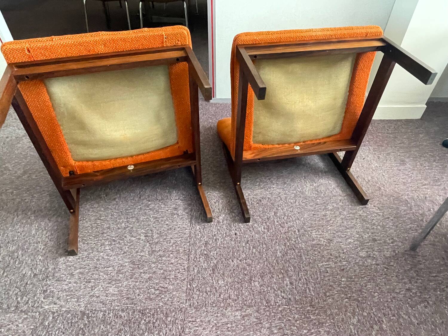 Pair of teak armchairs