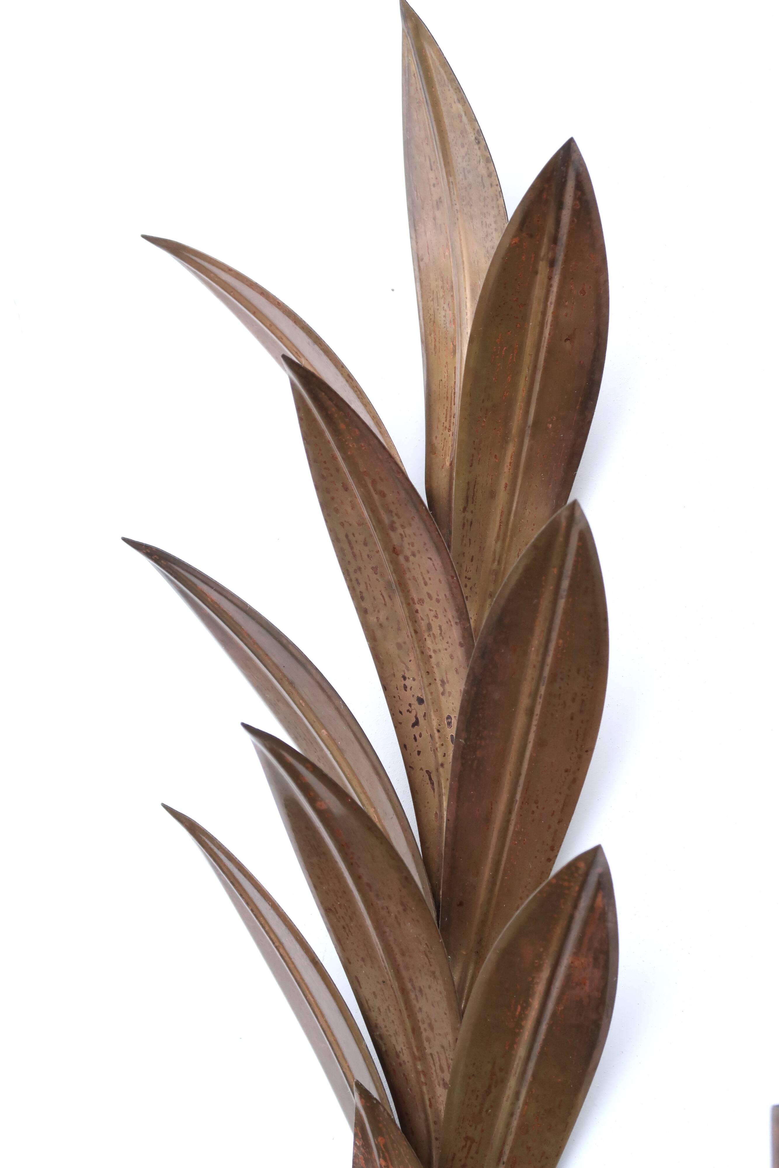 Pair of brass “leaf” wall lights, 1970s