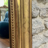 Mirror 153/101cm Louis-Philippe with pediment and pearl gold leaf.