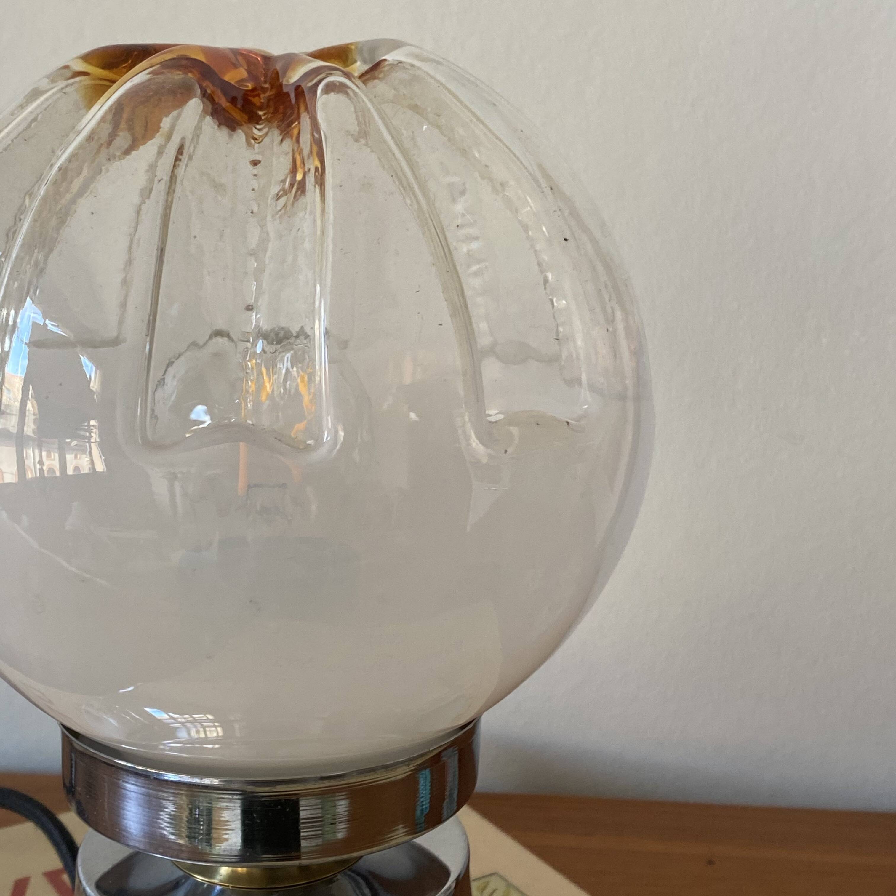 Vintage globe lamp in Murano glass by Mazzega and chrome metal.