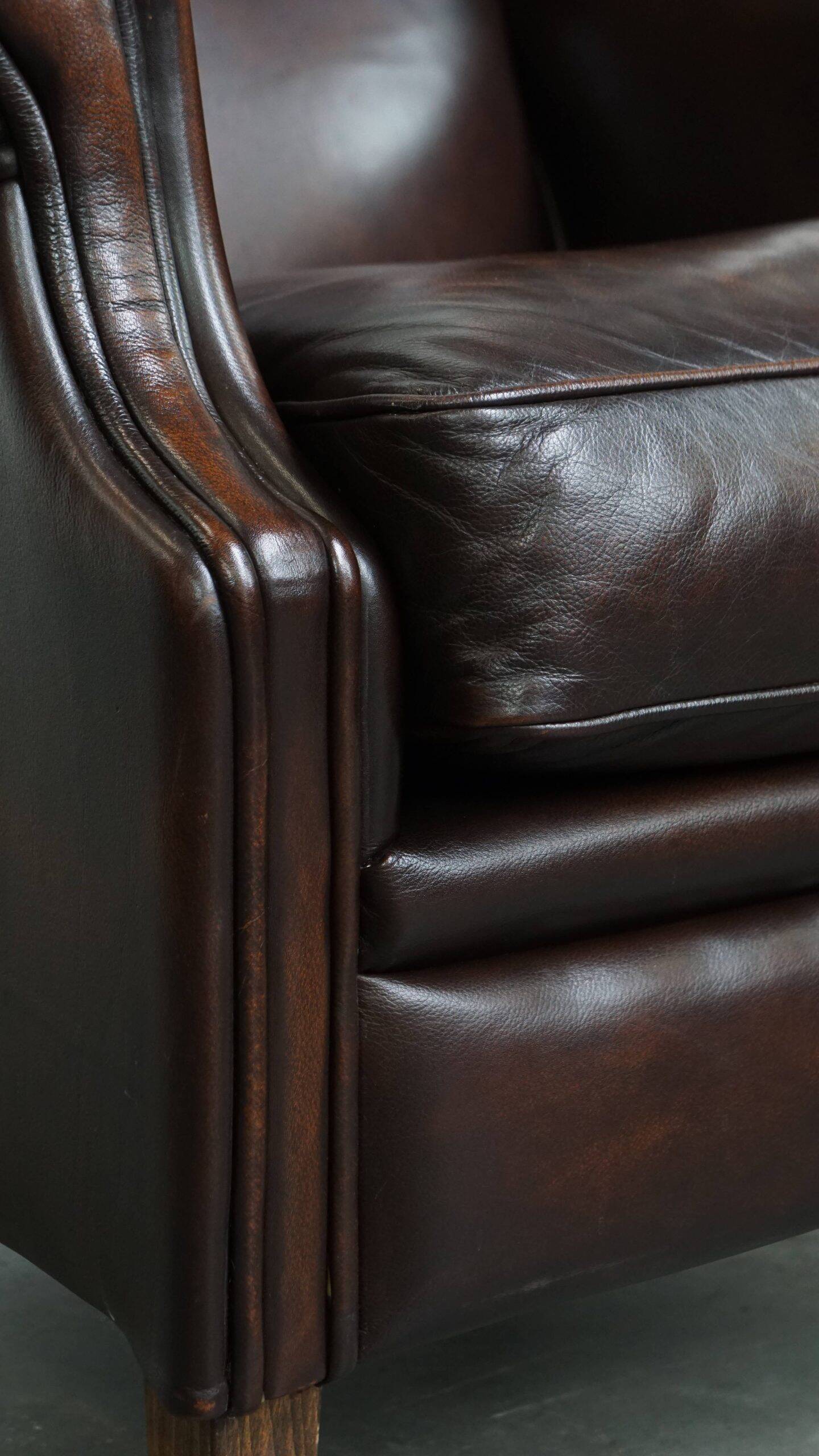 Very beautiful wing chair made of cowhide leather in English style