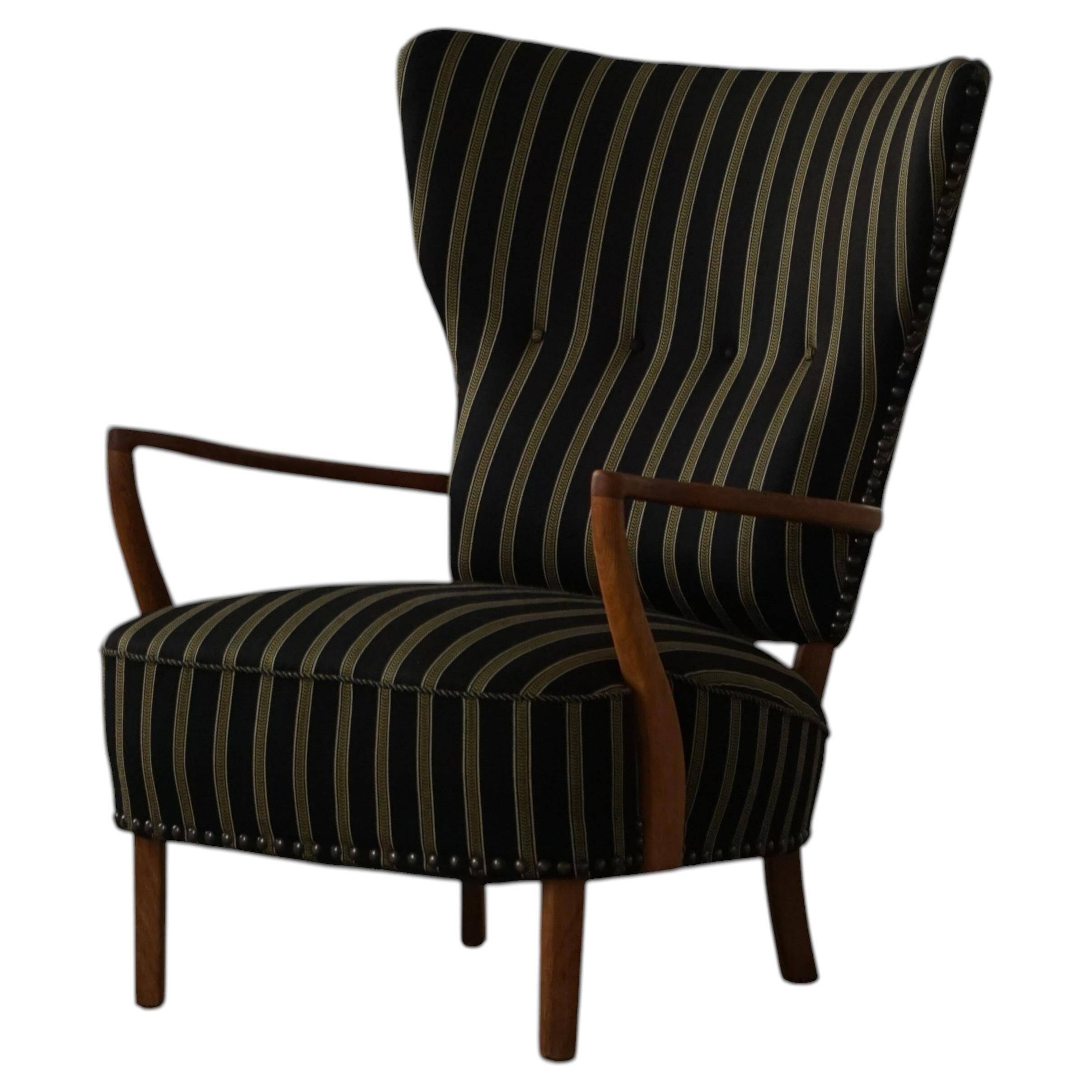 Danish mid-century chaise longue with a convertible backrest in oak, Viggo Boesen, 1950s.
