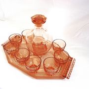 Vintage service in pink salmon glass – Carafe, 8 glasses, and Art Deco tray.