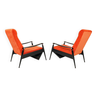Pair of vintage armchairs in burnt orange, MCM design from the 1960s.