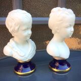 Children's busts in biscuit