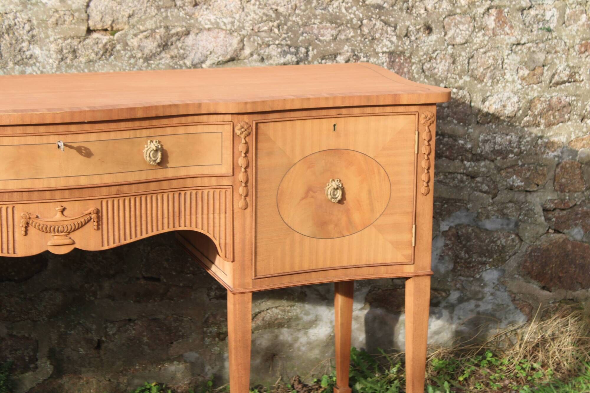 English-made enfilade in Louis XVI style with light wood veneers.