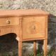 English-made enfilade in Louis XVI style with light wood veneers.