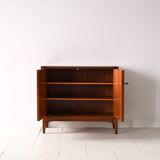 Storage cabinet with hinged doors