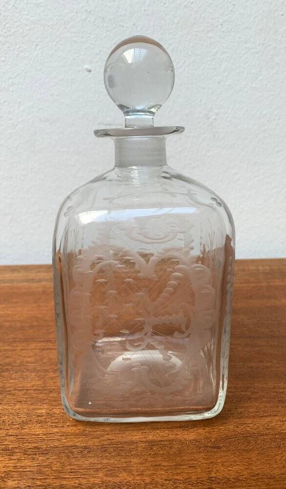 Vintage Danish glass bottle with engraving.
