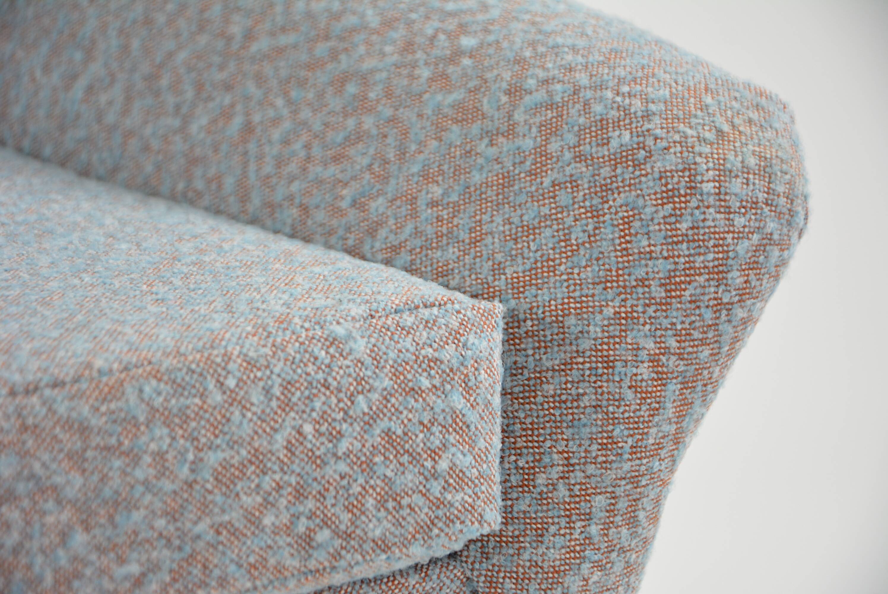 Modernist shell armchairs from the 1970s.