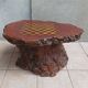 Brutalist chessboard coffee table made from tree stump.