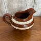 Old milk jug sarreguemines model mary ceramic brown & white
