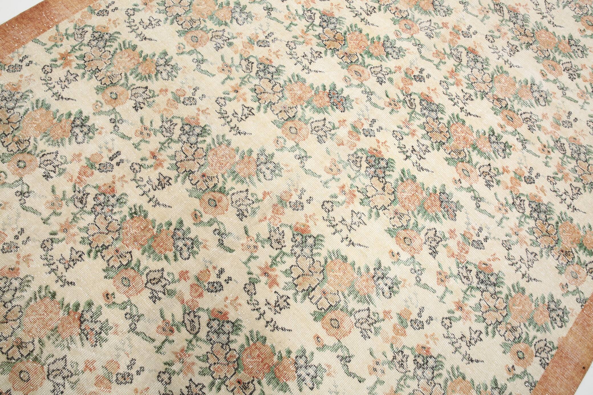 Tapis en laine et coton à décor floral