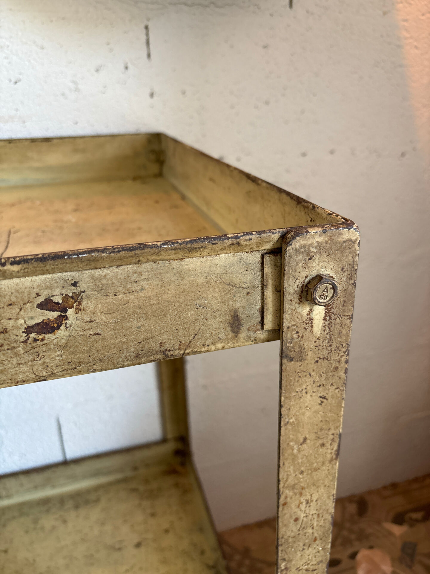 Beige metal shelf