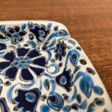 Vintage handmade blue ceramic ashtray with deer and flower ornament from Rodos Ceramics.