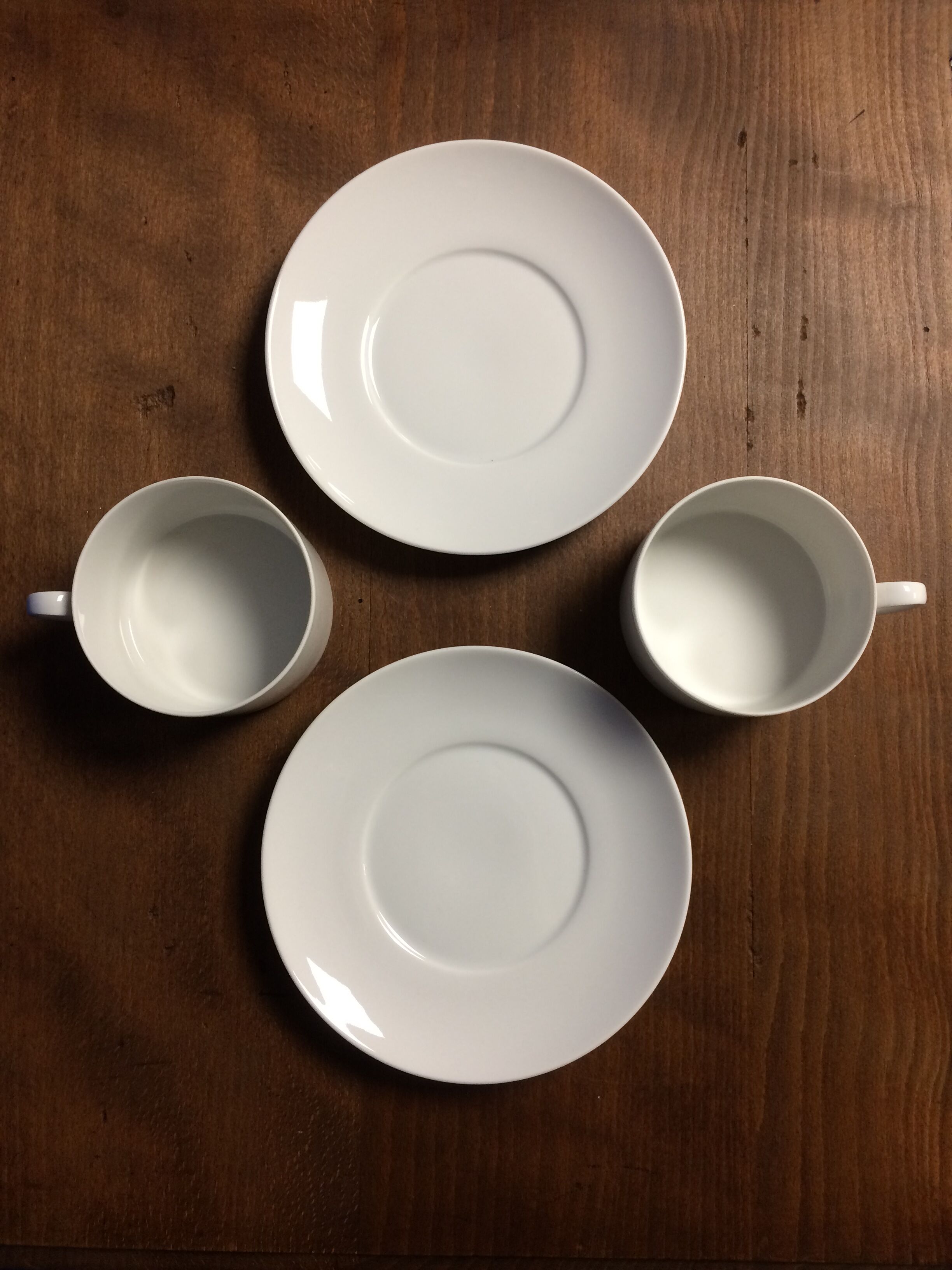 Pair of white porcelain cups and saucers