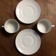 Pair of white porcelain cups and saucers