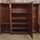 Important Art Deco library in amboyna and mahogany veneer.
