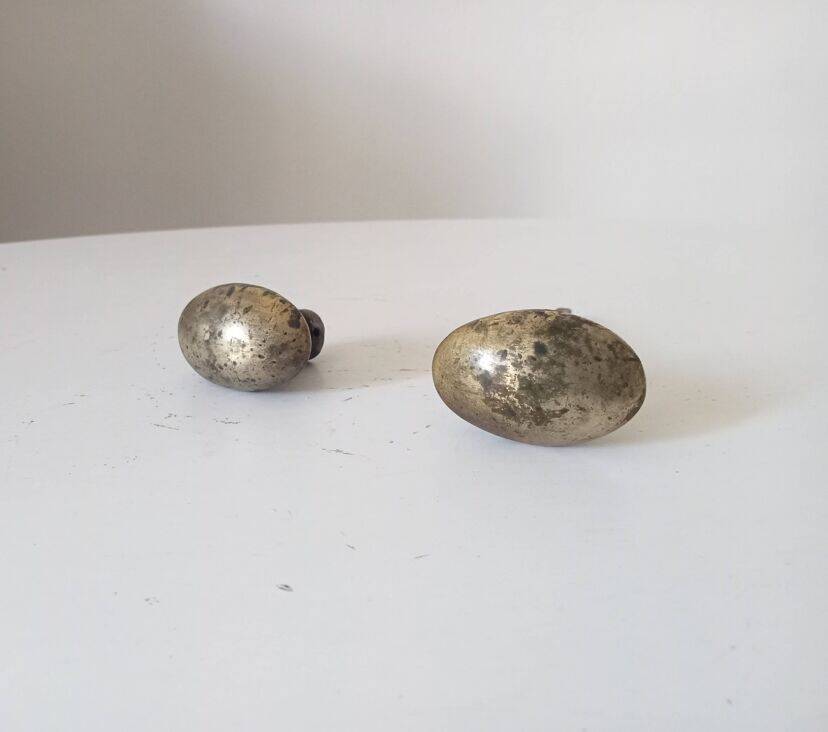 Pair of antique oval door handles in solid gold-plated brass.