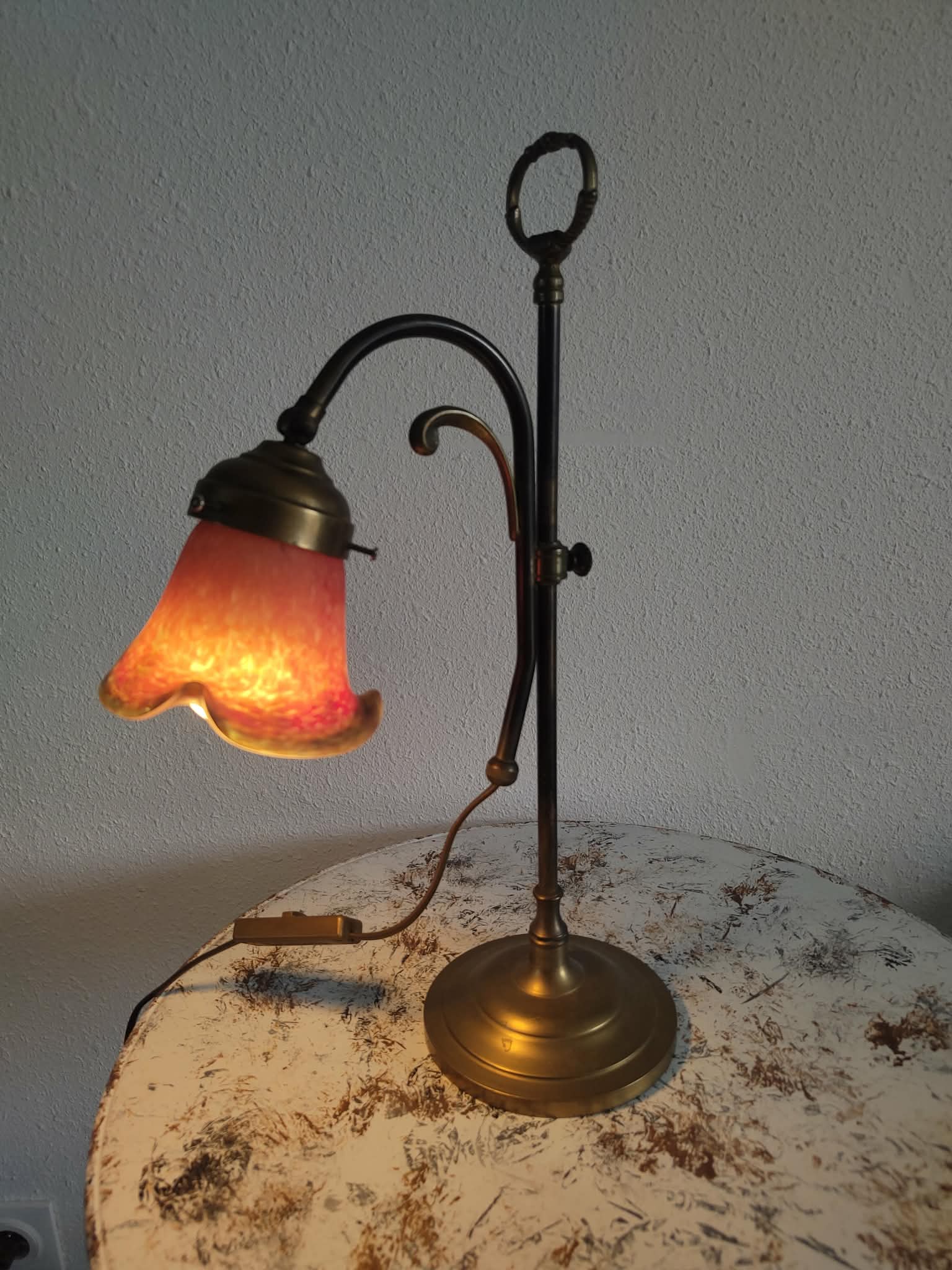 Brass articulated lamp with glass paste signed art of France.