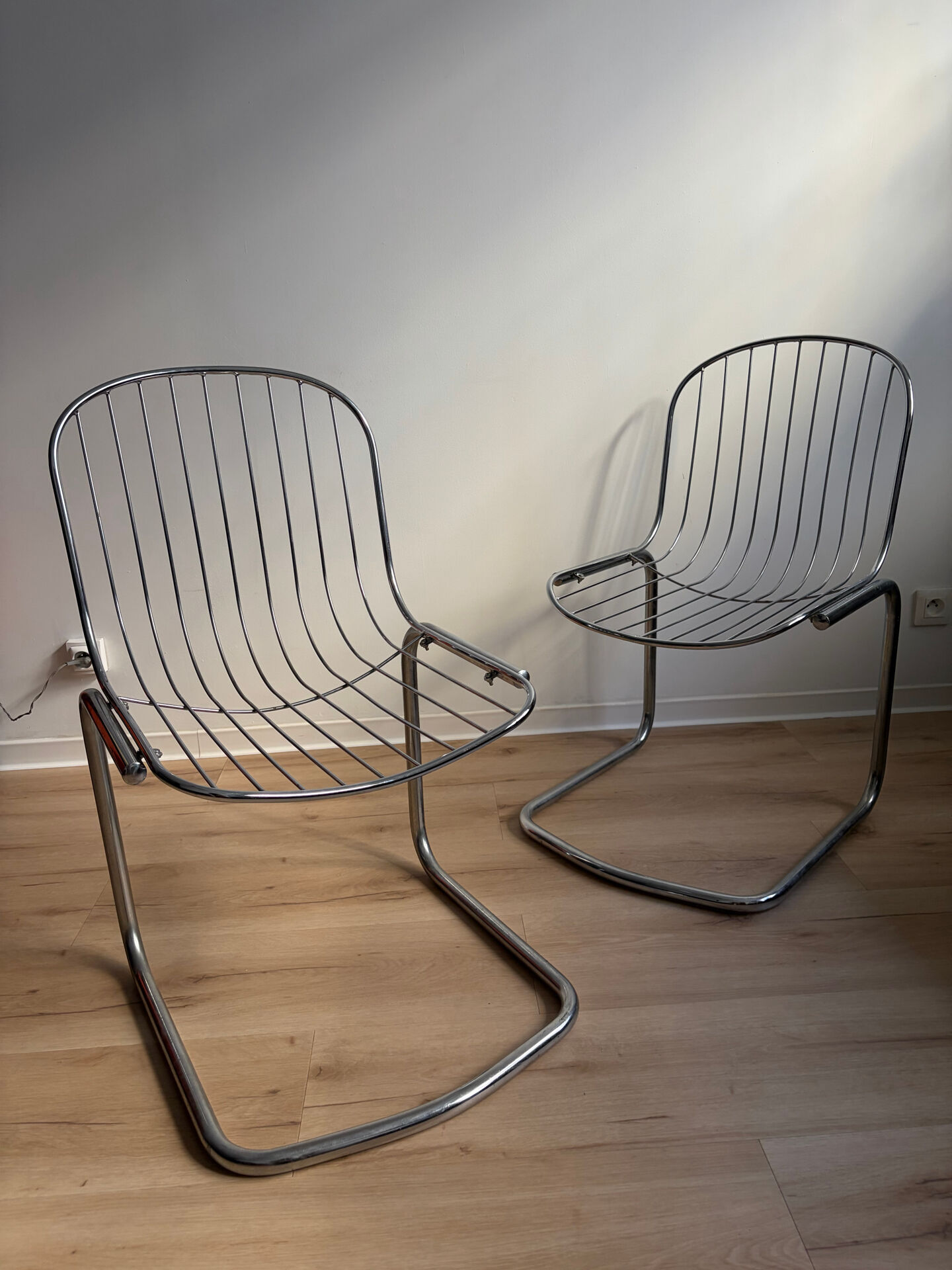 Pair of G. Rinaldi metal/chrome chairs