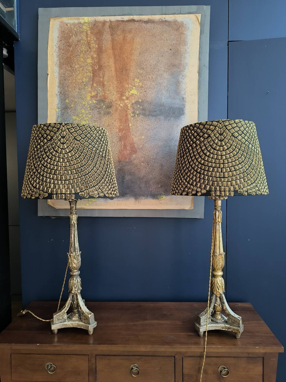 Pair of gilded wooden candlesticks. 19th century.