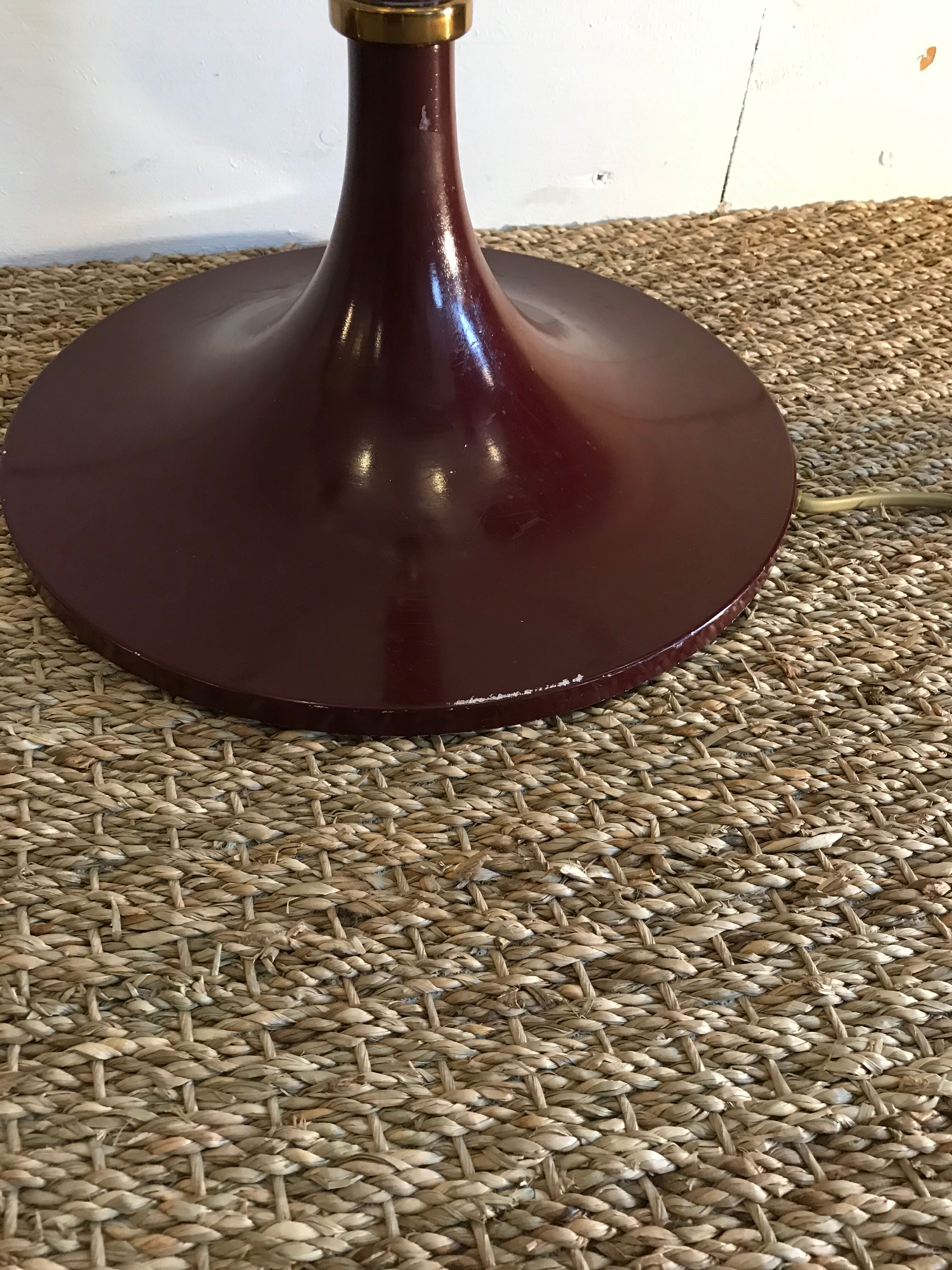 Pair of red enamelled metal floor lamps