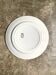 Round dish St Amand in enamelled iron earth white, blue and green