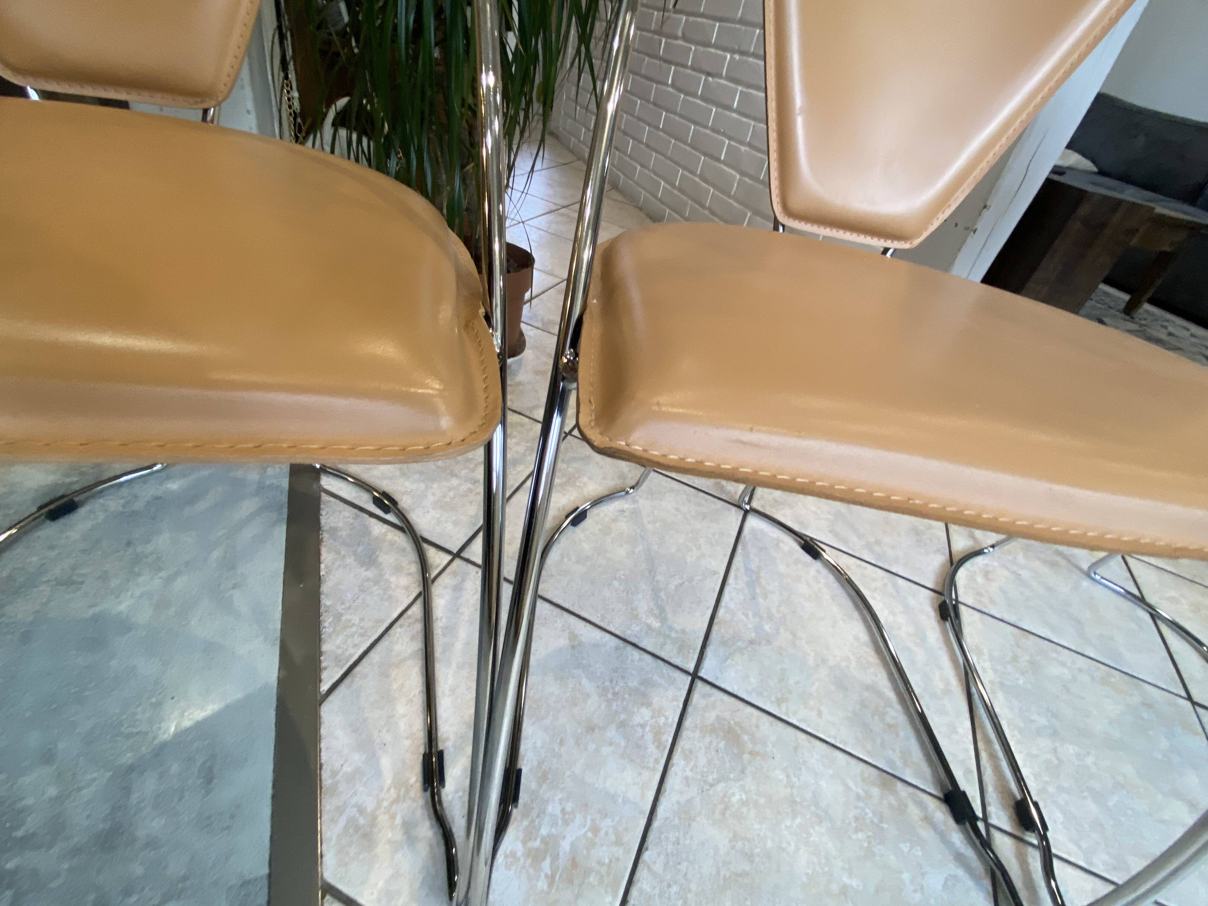 Set of 4 Linda armchairs by Arrben in camel leather with a chrome frame.