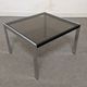 Bedside table or end of sofa in chromed metal and smoked glass from the 70s