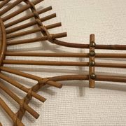 Vintage guitar-shaped rattan mirror