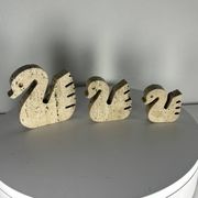Swans Enzo Mari travertine for Fratelli Mannelli, Italy, 1970.