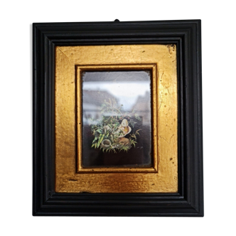 Old frame black and gold bird drawing
