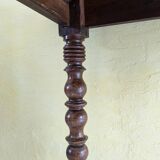 Large walnut desk with turned legs