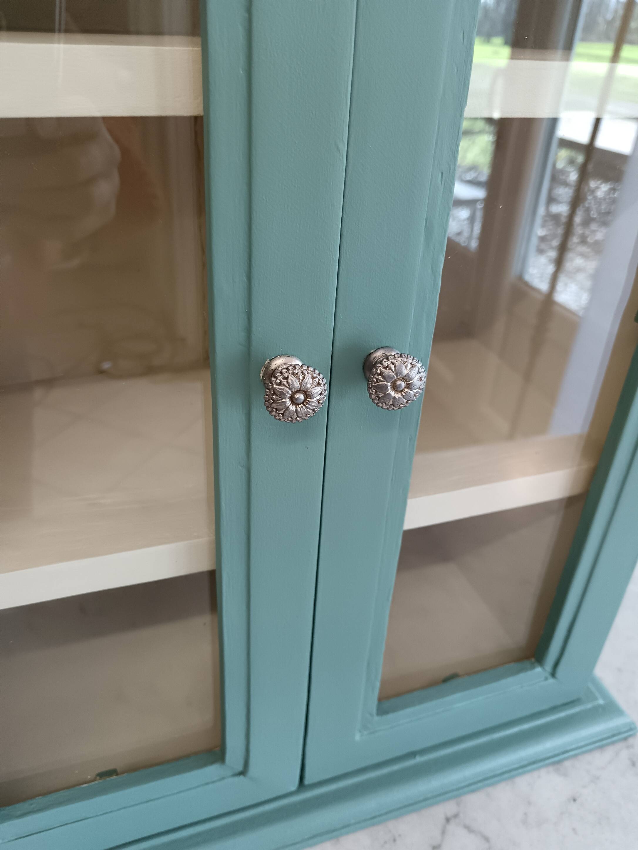 Green and beige 2-door wall display case