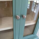 Green and beige 2-door wall display case