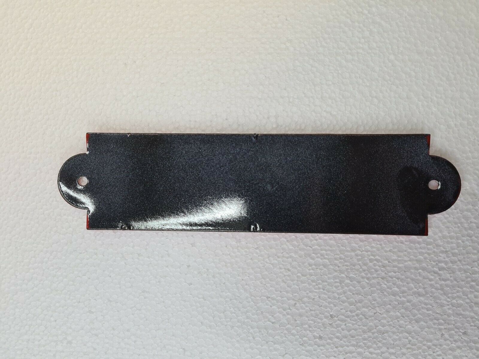 Enamelled plaque "the magpie that sings"