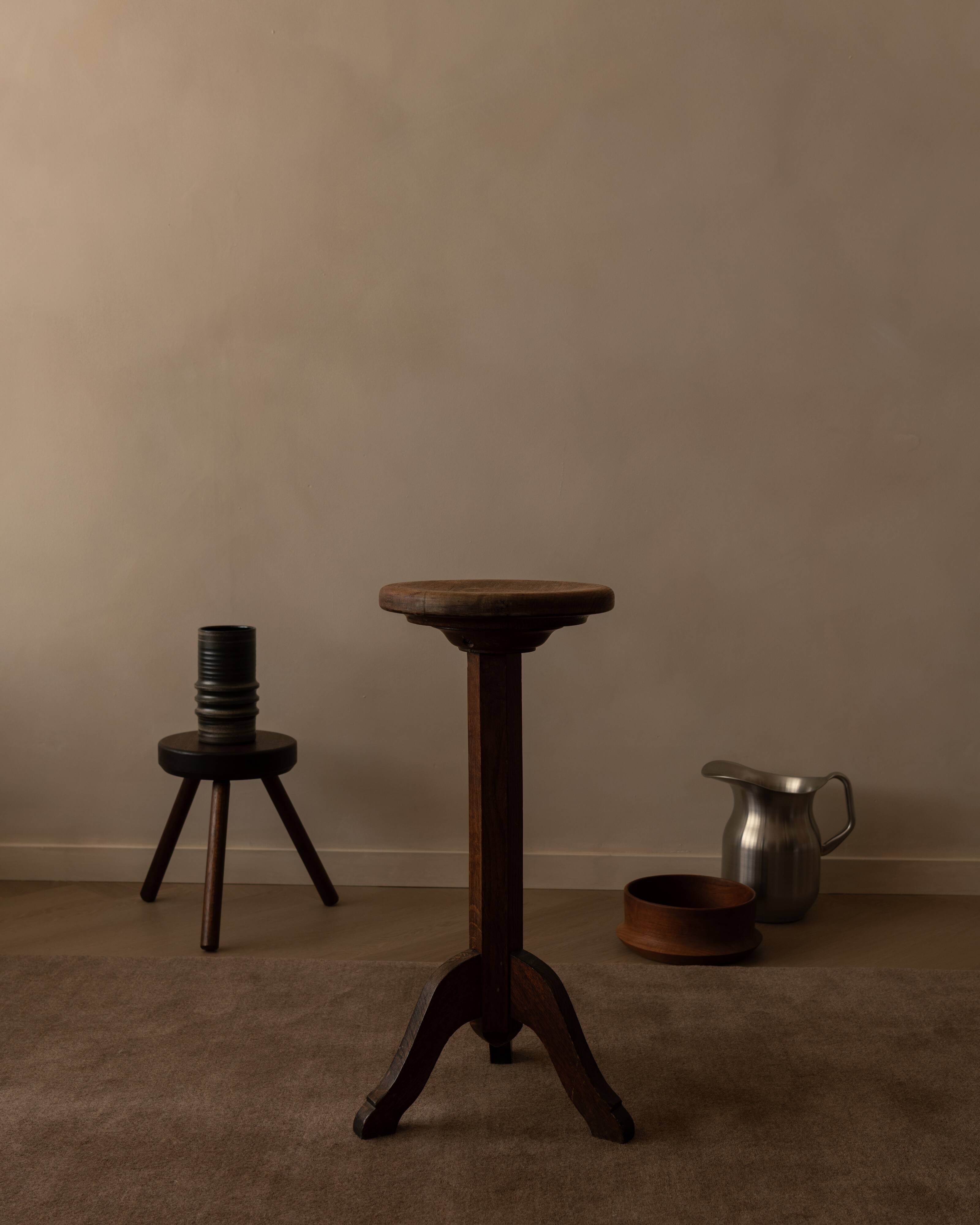 Vintage wooden pedestal plant stand