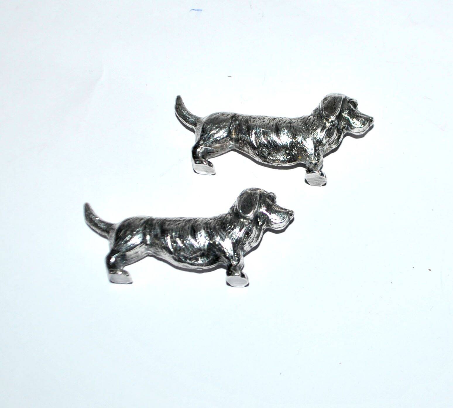 Set of 2 vintage animal knife rests, dachshund and basset hound, in silver-plated metal.