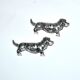 Set of 2 vintage animal knife rests, dachshund and basset hound, in silver-plated metal.