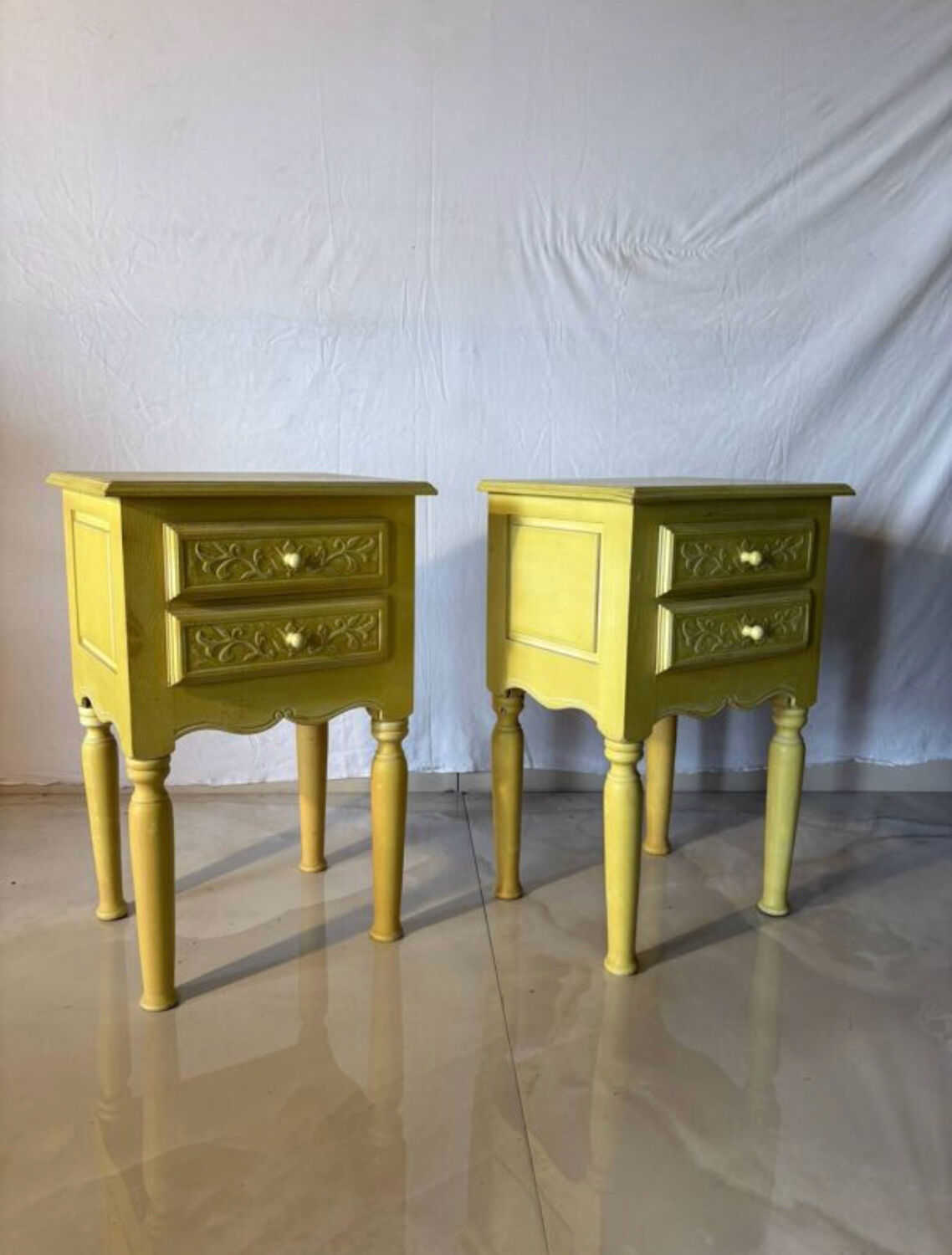 Pair of vintage carved wooden bedside tables.
