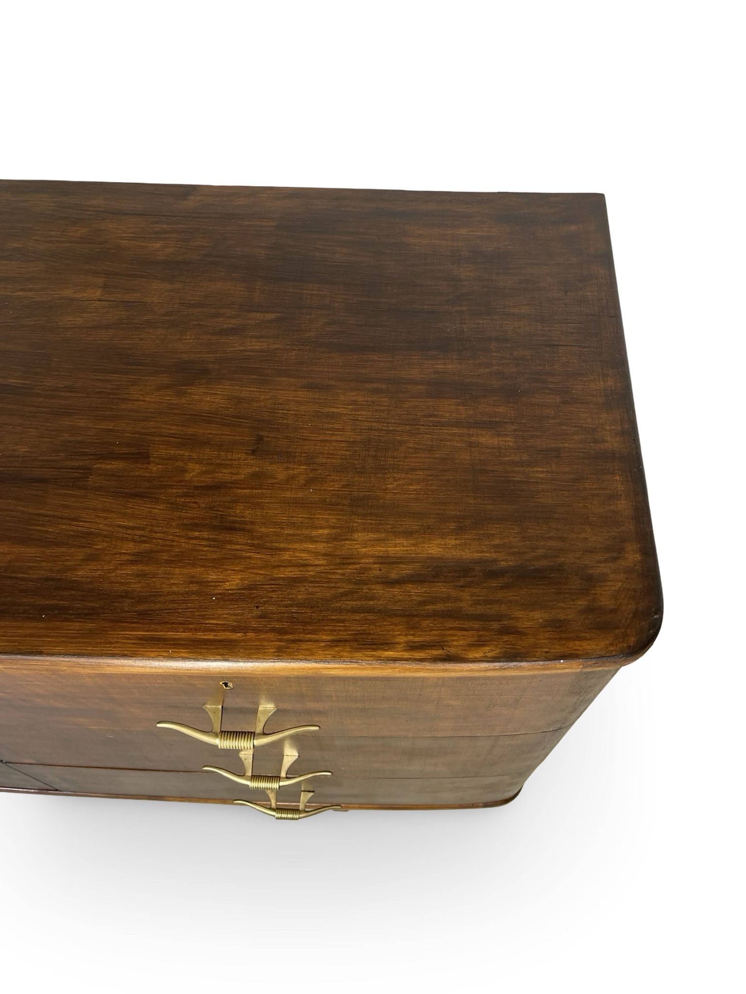 A vintage Italian chest of drawers, made of veneered walnut and solid wood,