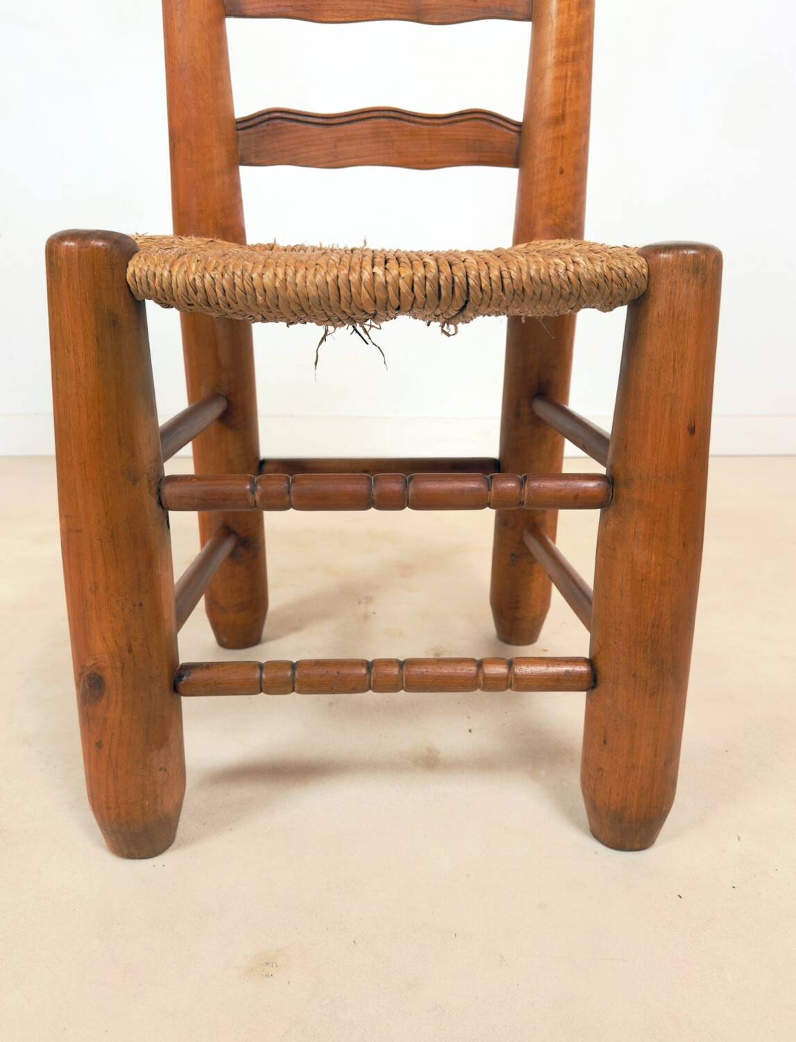 Vintage wooden chair with rush seating