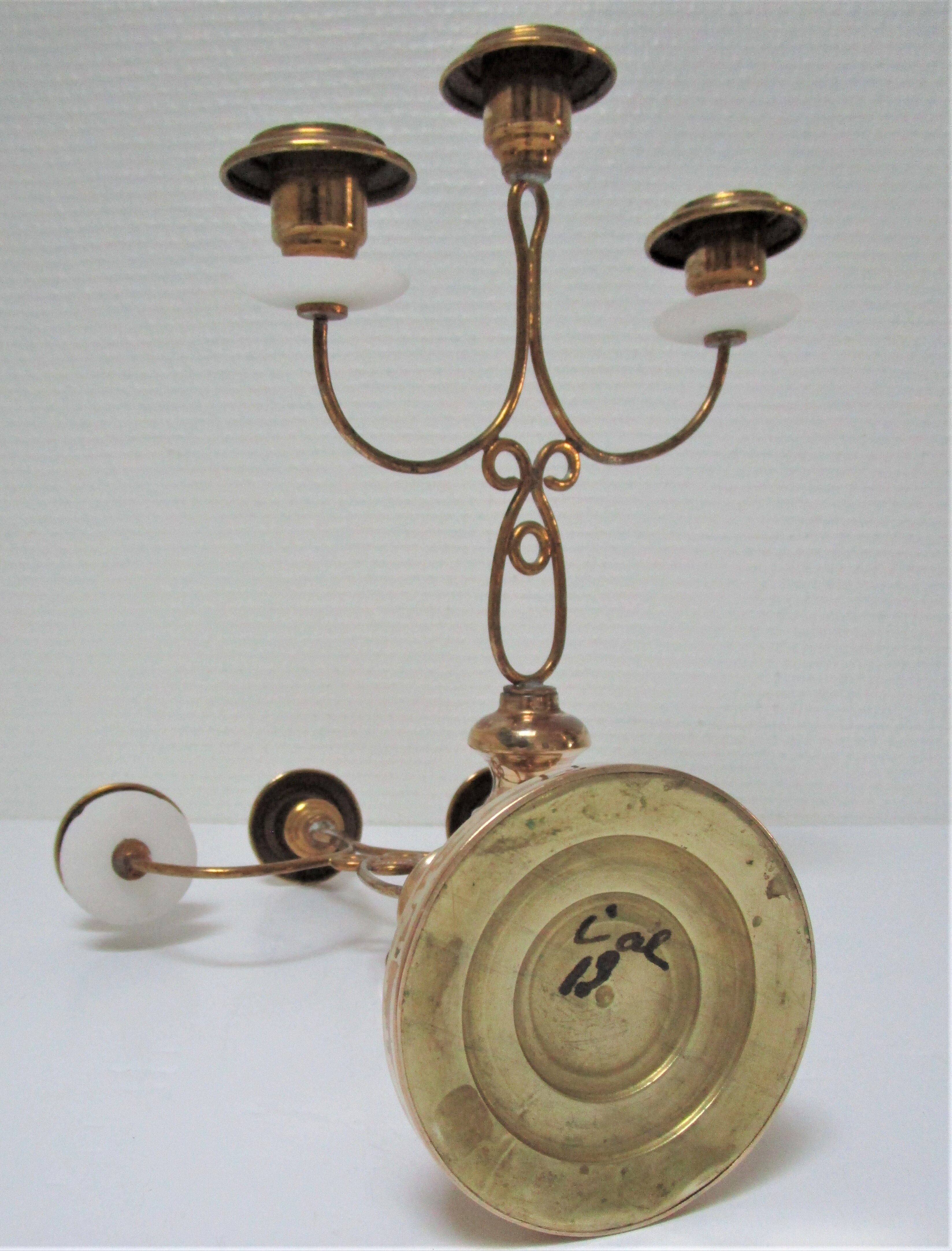 Pair of brass and three-pointed stone candelabra candle holders early twentieth century