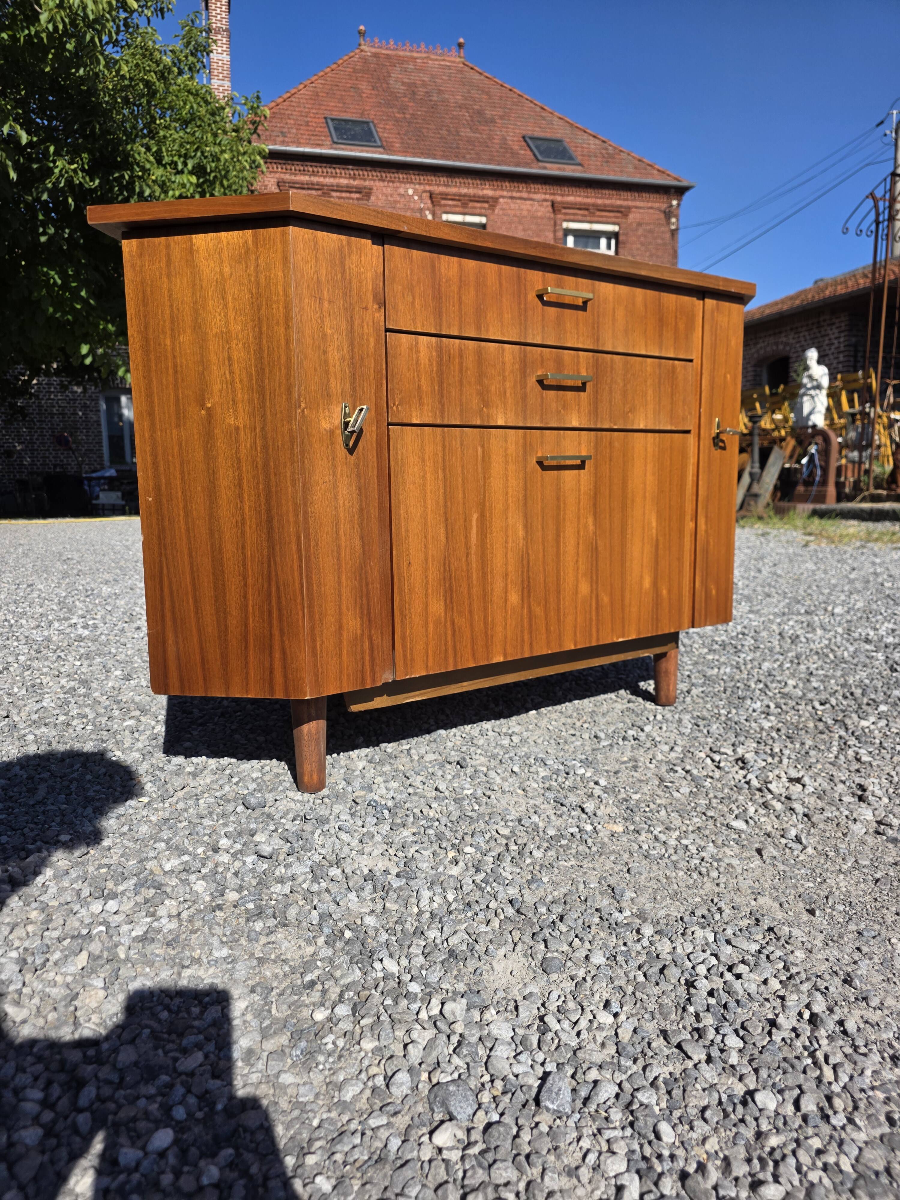 Scandinavian corner unit in teak from the 1960s.