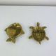 Pair of animal trinket trays in brass, fish and turtle.