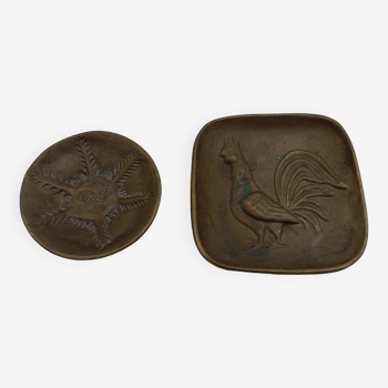 Ashtrays or small bronze pockets signed by Quimper ceramist Alain Piclet.