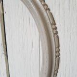 Oval frame patinated linen