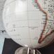 Decorative terrestrial globe on silver metal stand – explorer style