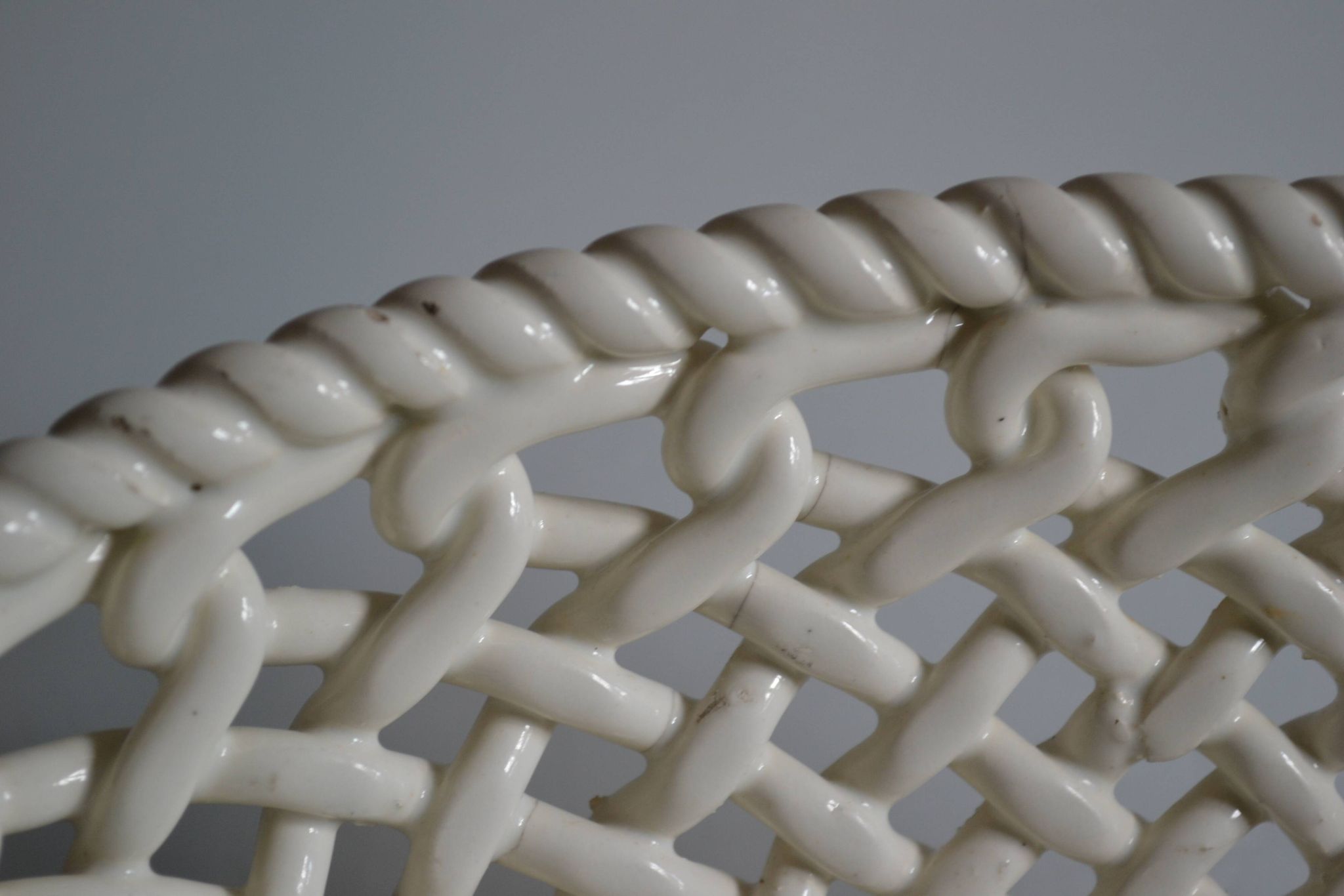 Woven ceramic oval fruit bowl or dish